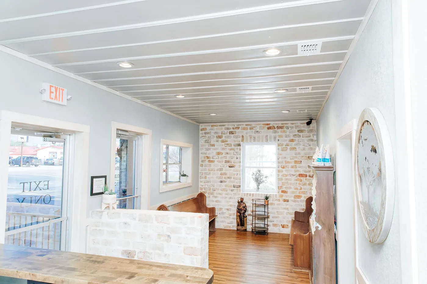 The clinic lobby with its stone accent wall and front desk